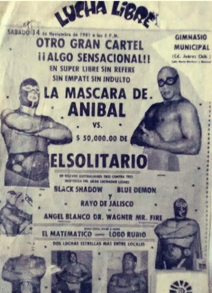File:Aníbal vs Solitario mask vs money.jpg
